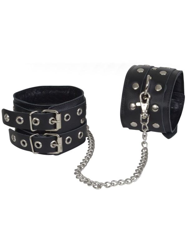 Чёрные кожаные оковы, соединенные цепочкой 